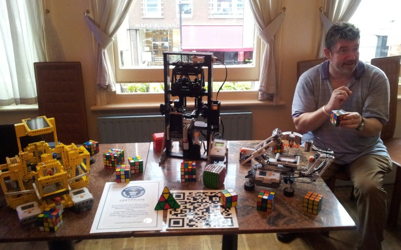 David with his robots and Rubik cubes